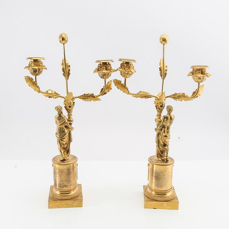 A pair of Empire candelabras from the first half of the 19th century.