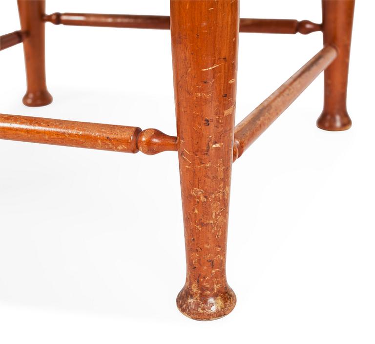 A Josef Frank green leather and mahogany stool, Svenskt Tenn.