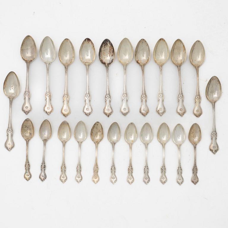 Skedar, 23 st, silver, "Olga", CG Hallberg, Stockholm 1910.