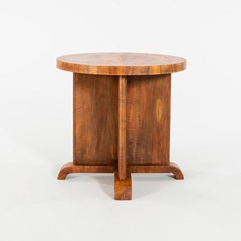 An Art Déco-style walnut table, manufactured in modern times.