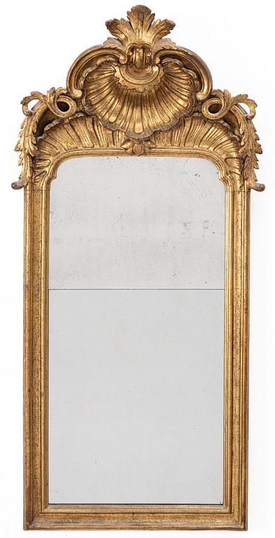 A Rococo mirror, 18th century.