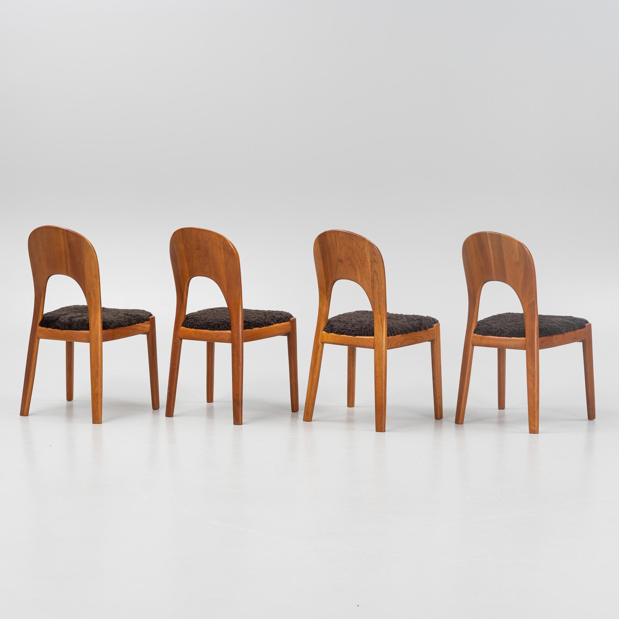 Niels Koefoed, eight teak dining chairs upholstered in new sheep skin, Denmark, 1960's.