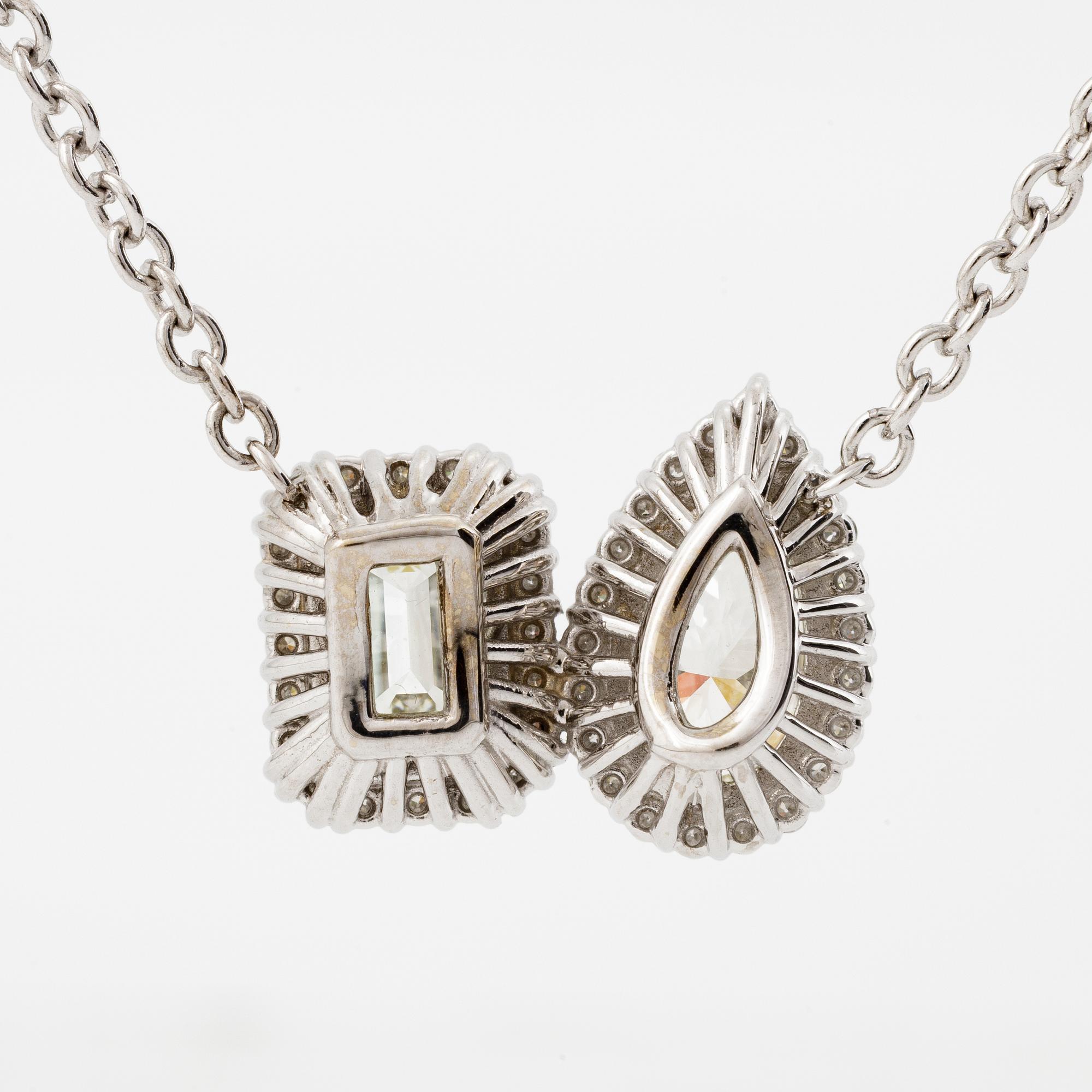 Necklace 18K white gold with pear-shaped and emerald-cut diamond accompanied by IGI and GIA report.
