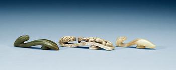 1725. A set with three archaistic nephrite belt buckles, Qing dynasty.