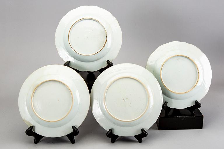 A set of four Chinese Qianlong famille rose plates.