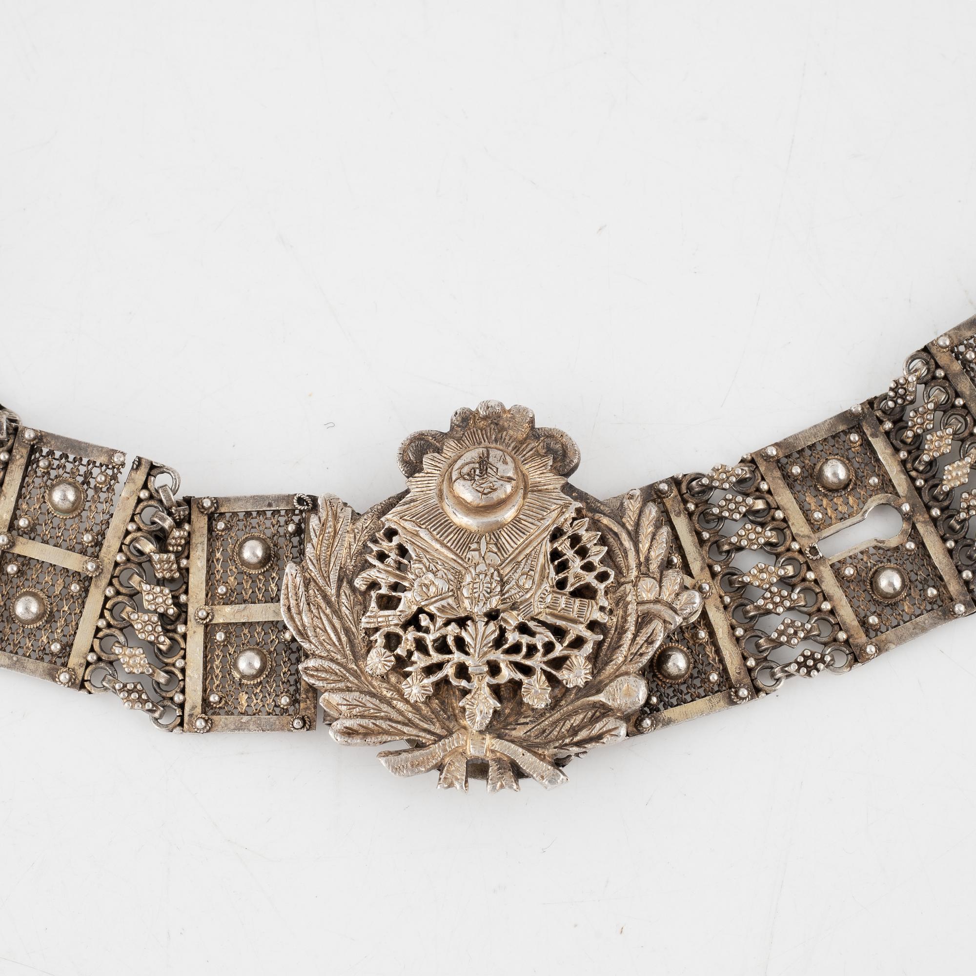 An Ottoman parcel gilt silver belt from Bitlis, mark of Kavafcıyan, around the turn of the 20th Century.