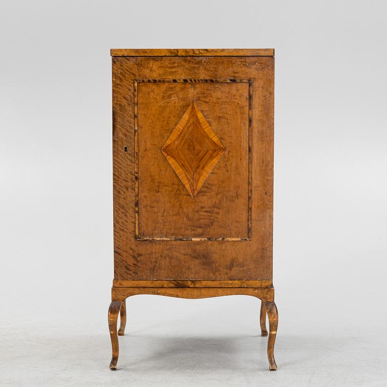 A birch music cabinet, first half of the 20th Century.