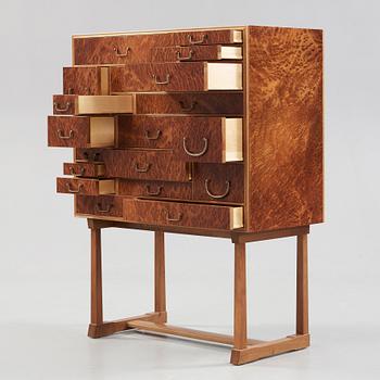 A Josef Frank burr wood, mahogany and walnut cabinet, Svenskt Tenn, model 881.