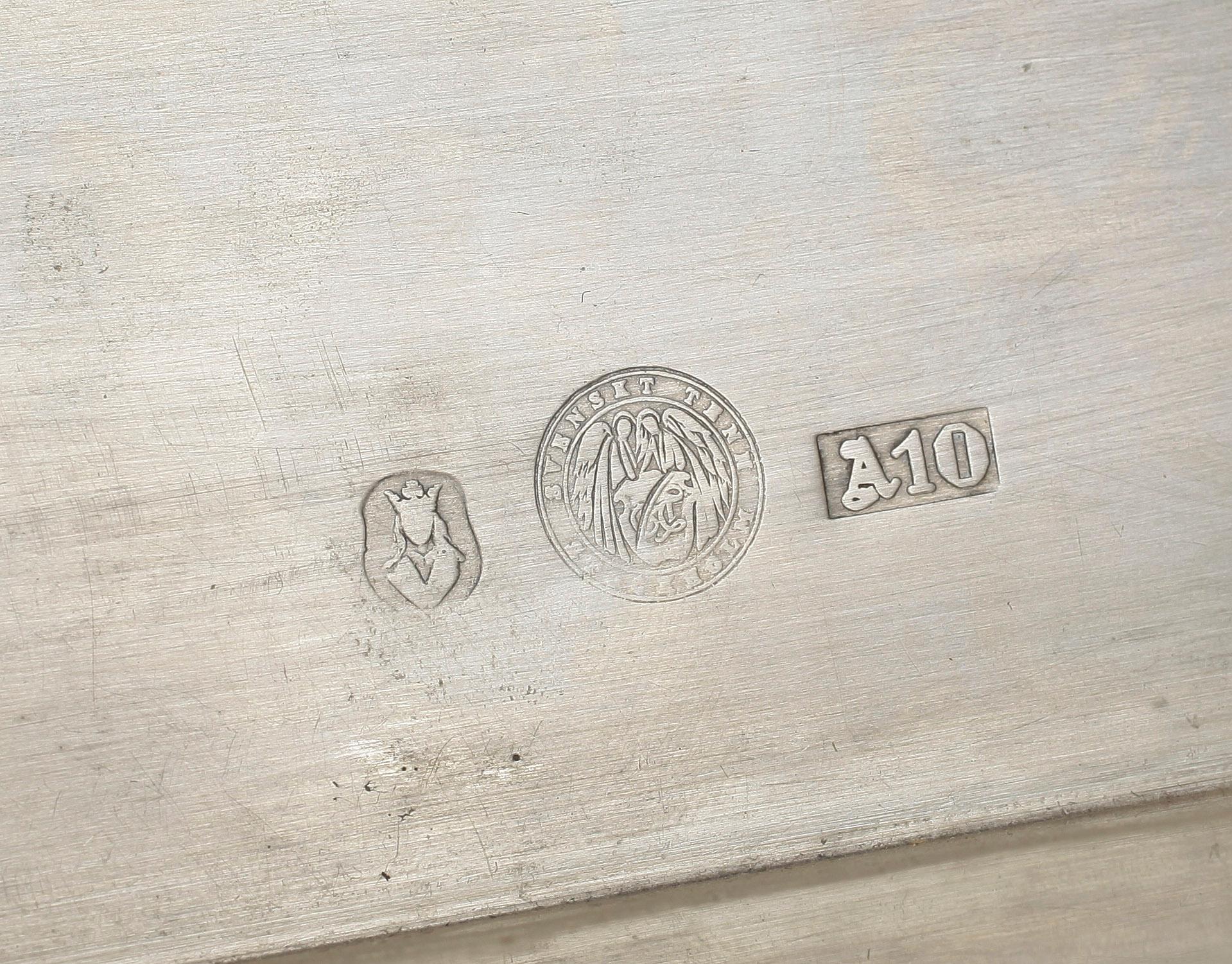 BOKSTÖD, tenn samt mässing, Anna Petrus, Svenskt Tenn, Stockholm 1975, modellnummer 429.