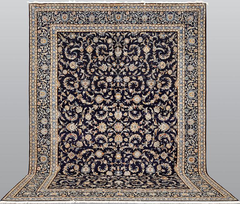 A Keshan carpet, c. 450 x 322 cm.