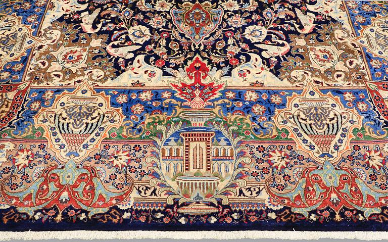 A carpet, Figural Kashmar, ca 407 x 305 cm.
