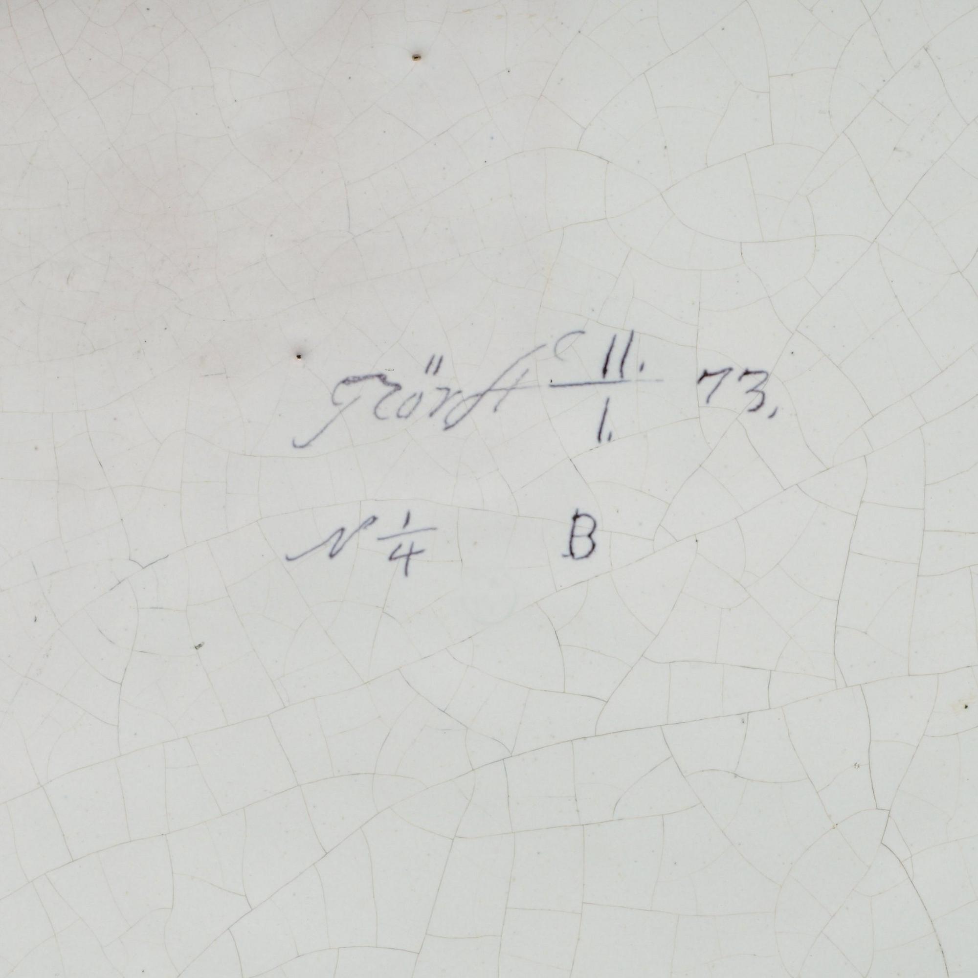 A Swedish Rörstrand faience charger, dated 11/1 (17)73.