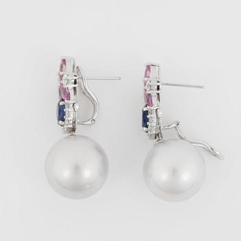 A pair of cultured South Sea pearl, sapphire and diamond earrings.