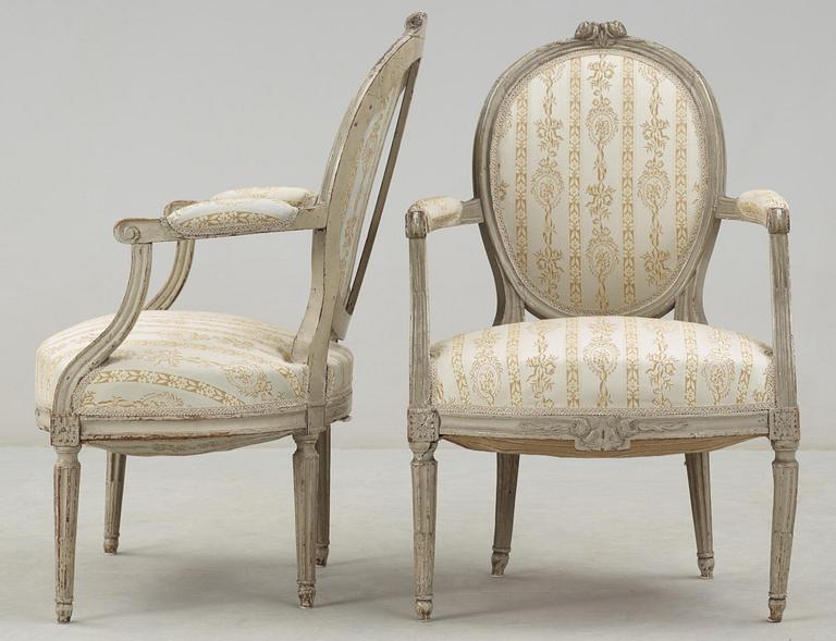 A pair of Louis XVI late 18th century armchairs.