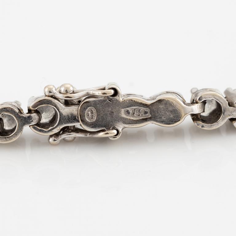 Tennis bracelet, 18K white gold and brilliant-cut diamonds.