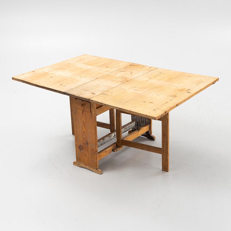 A pine gate-leg table, first part of the 19th century,