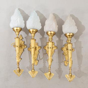 A set of four wall lamps later part of the 20th century.