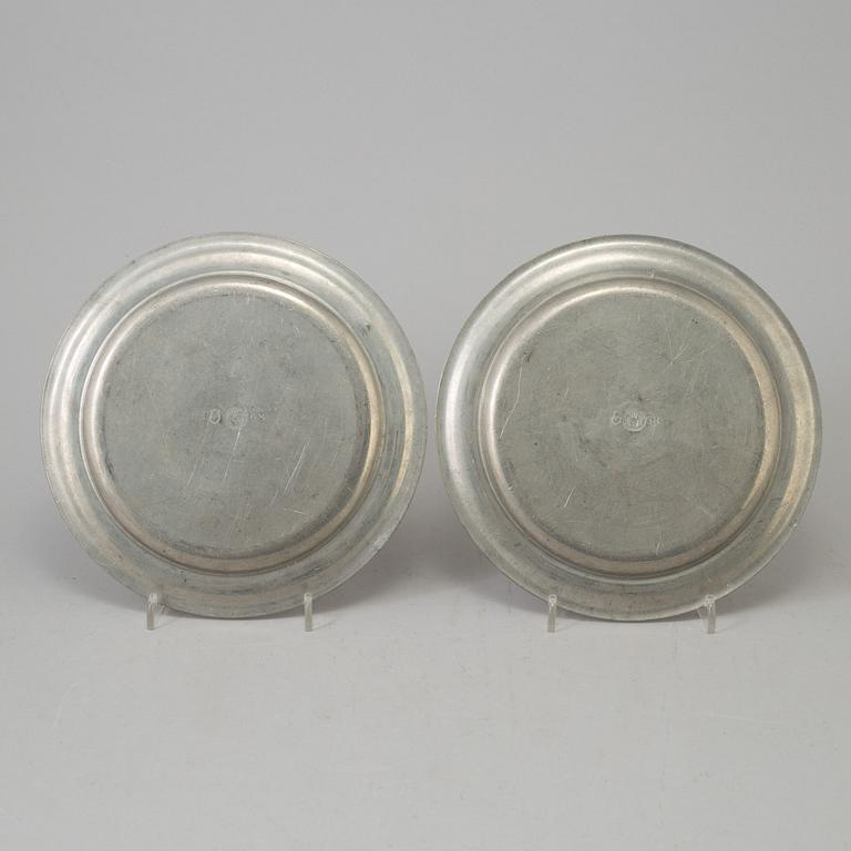 Two pewter Firma Svenskt Tenn plates from 1929.