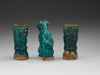 A set of two turquoise glazed altar vases and a Buddhist lion, Ming dynasty (1368-1644).