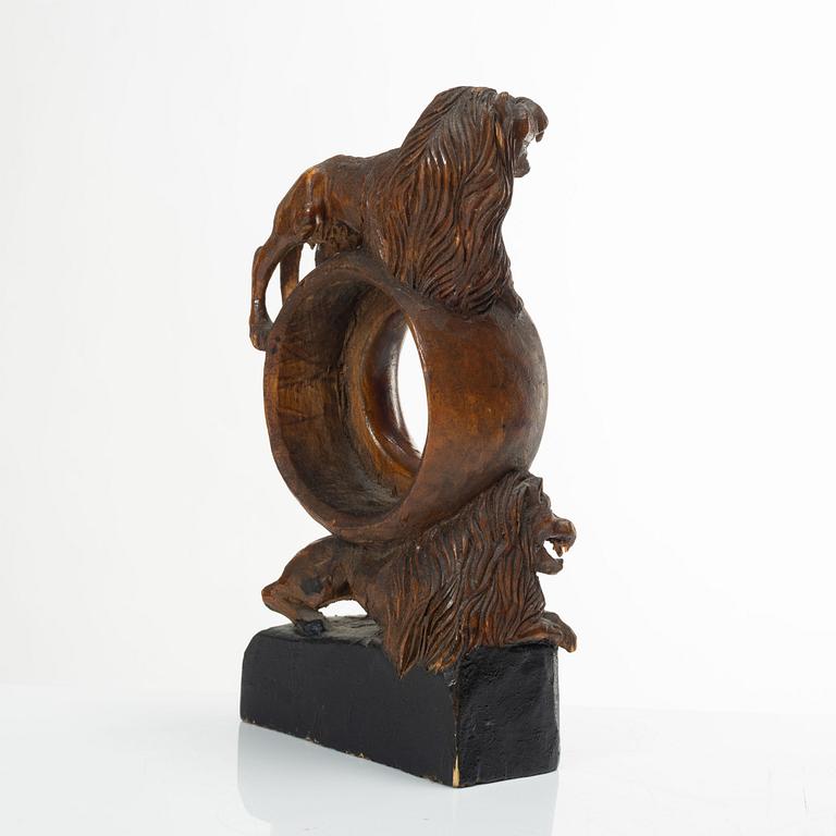 A carved pocket watch stand, Sweden, 19th century.