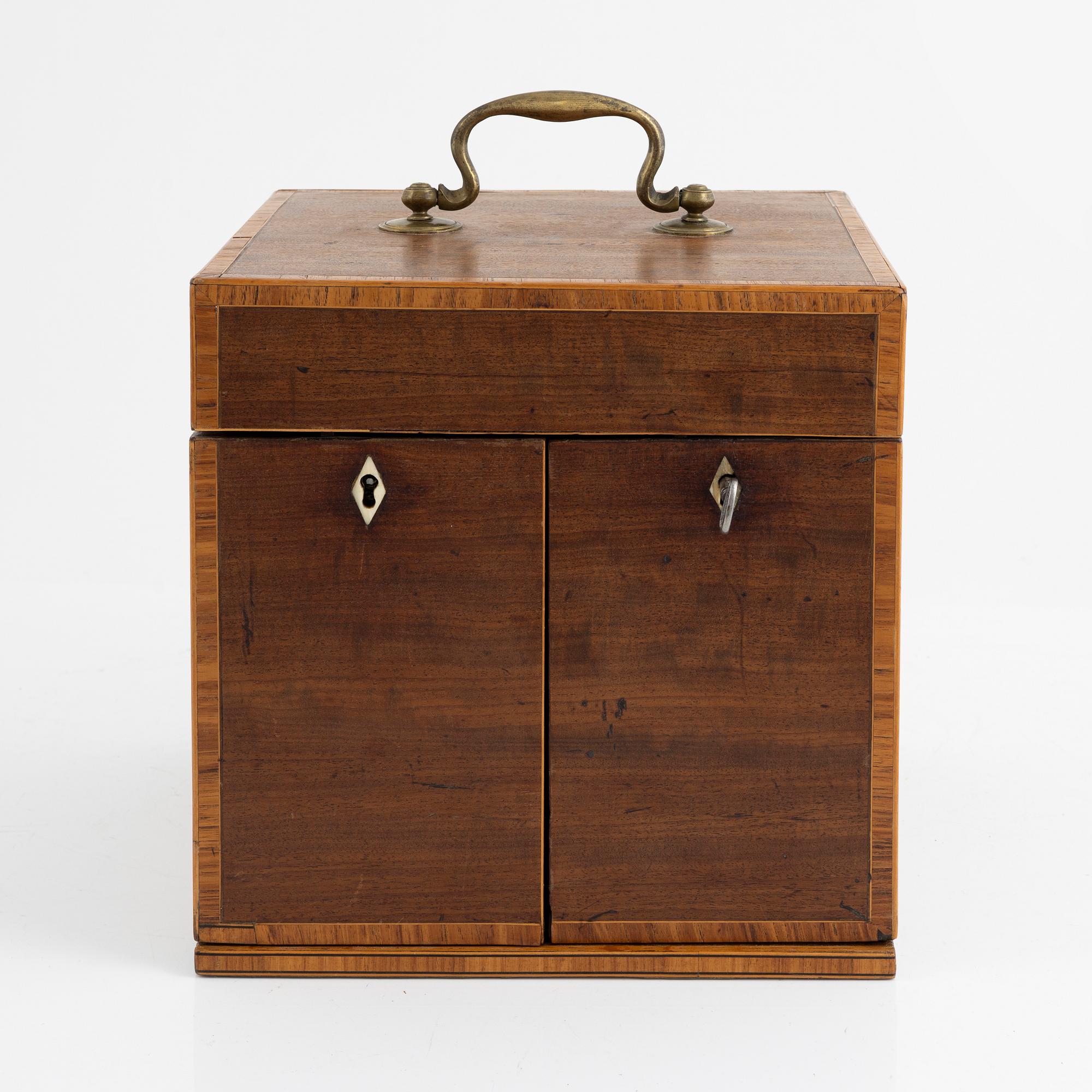 A George III mahogany apothecary cabinet, circa 1800.