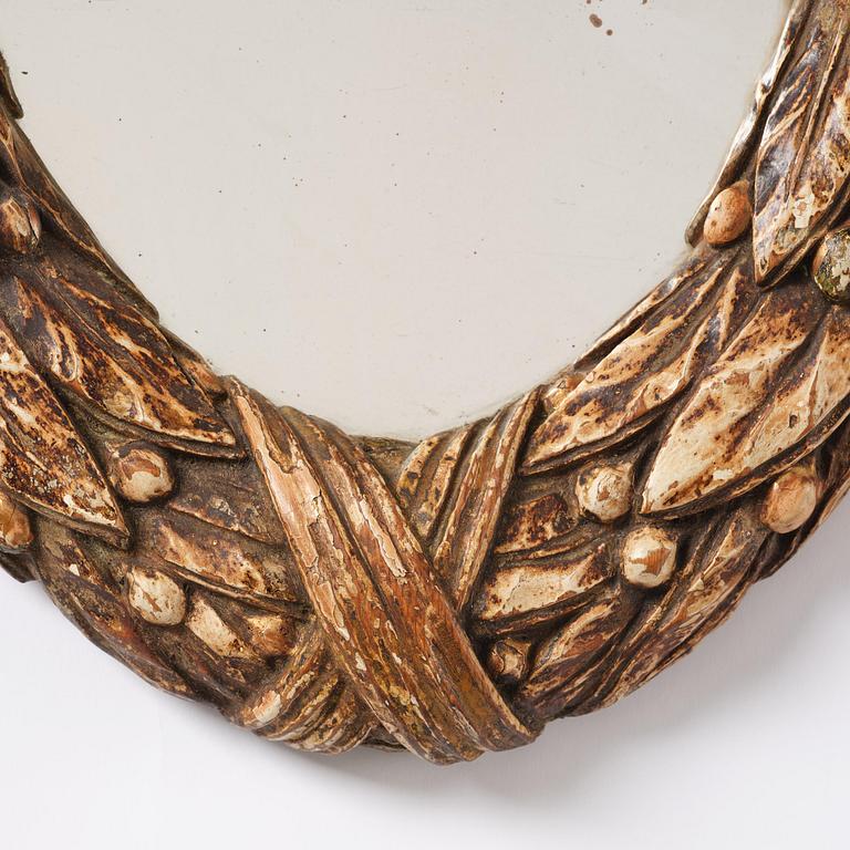 A Gustavian giltwood mirror, late 18th century.