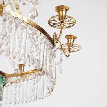 A German Louis XVI ormolu and cut-glass nine-light chandelier attributed to Johann Christoph Ermisch, late 18th century.