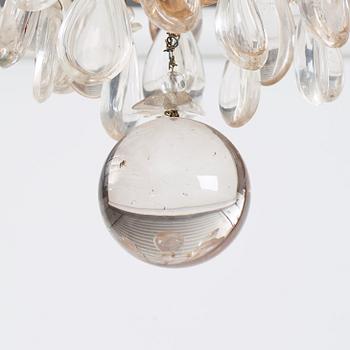 A Louis XV-style rock crystal eight-light chandelier, 20th century.