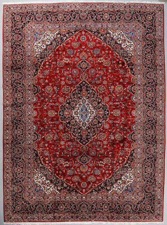 A Keshan rug, 405 x 295 cm.