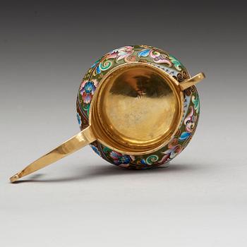 A Russian 20th century silver-gilt and enamel kovsh, marks of the 20th Artell, Moscow 1908-1917.