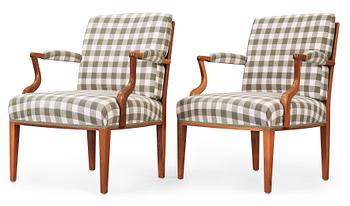 709. A pair of Josef Frank mahogany armchairs, Svenskt Tenn, model 969.