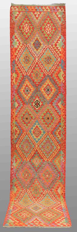 A runner, kilim, around 382 x 82 cm.