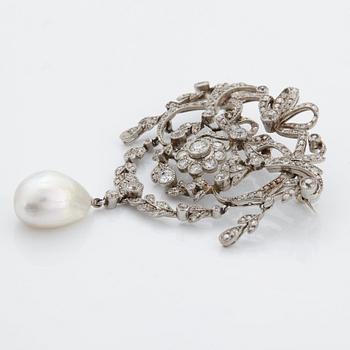 A platinum brooch set with old-cut diamonds and with a drop shaped pearl.