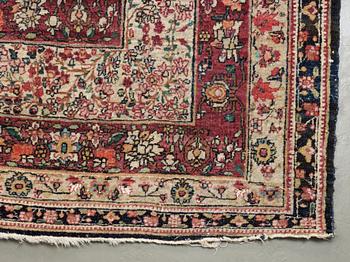 An antique Kerman Laver carpet, c. 586 x 385 cm.