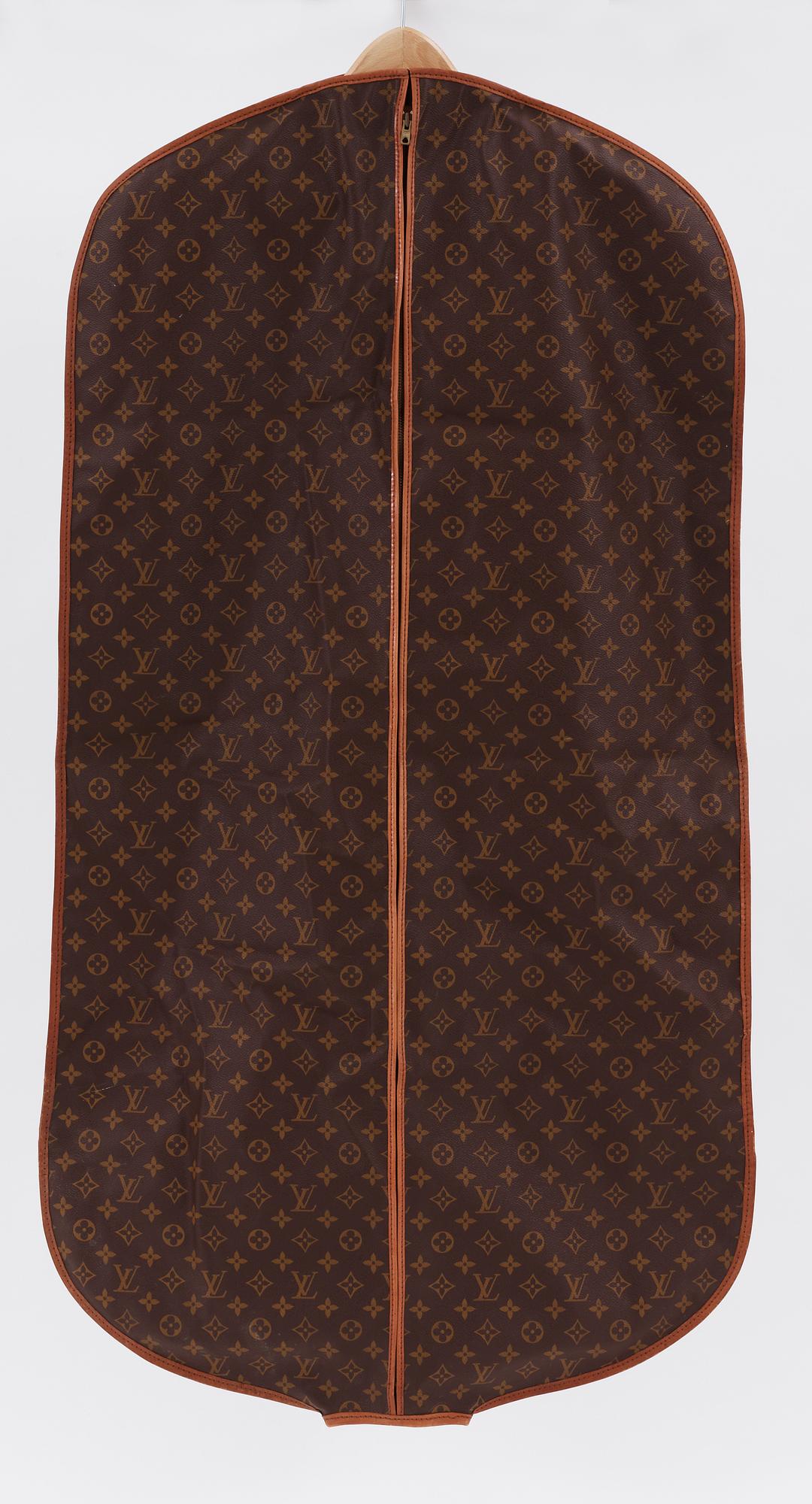 A monogram canvas wardrobe trunk by Louis Vuitton.