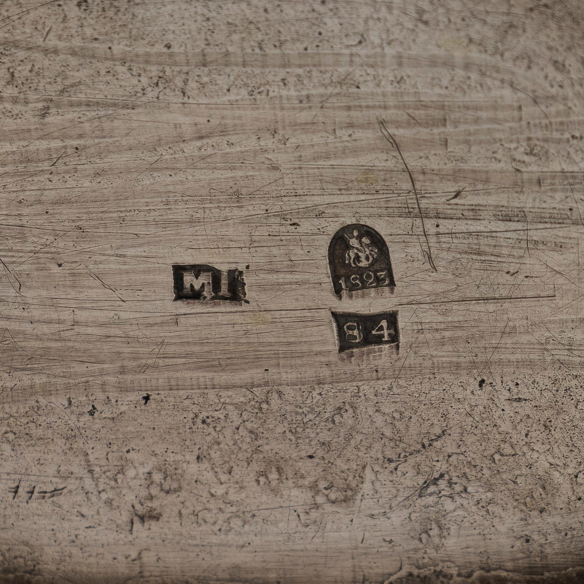 A silver teapot, maker's mark of Matvei Grechushnikov, Moscow 1823.