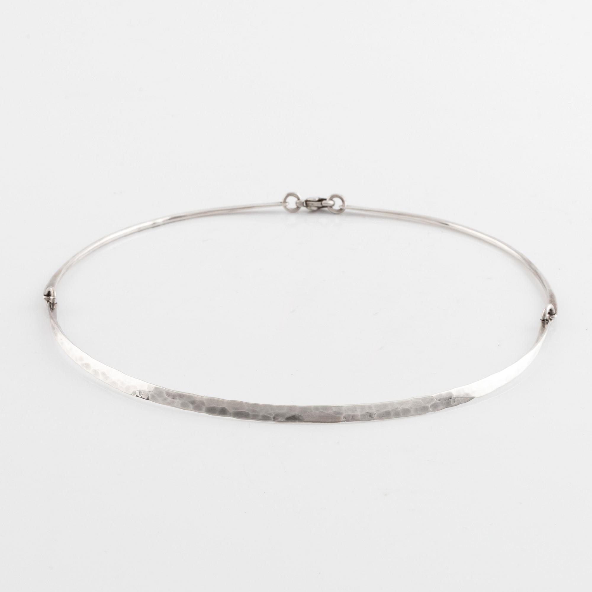 Annie Jägbeck silver necklace and earrings.