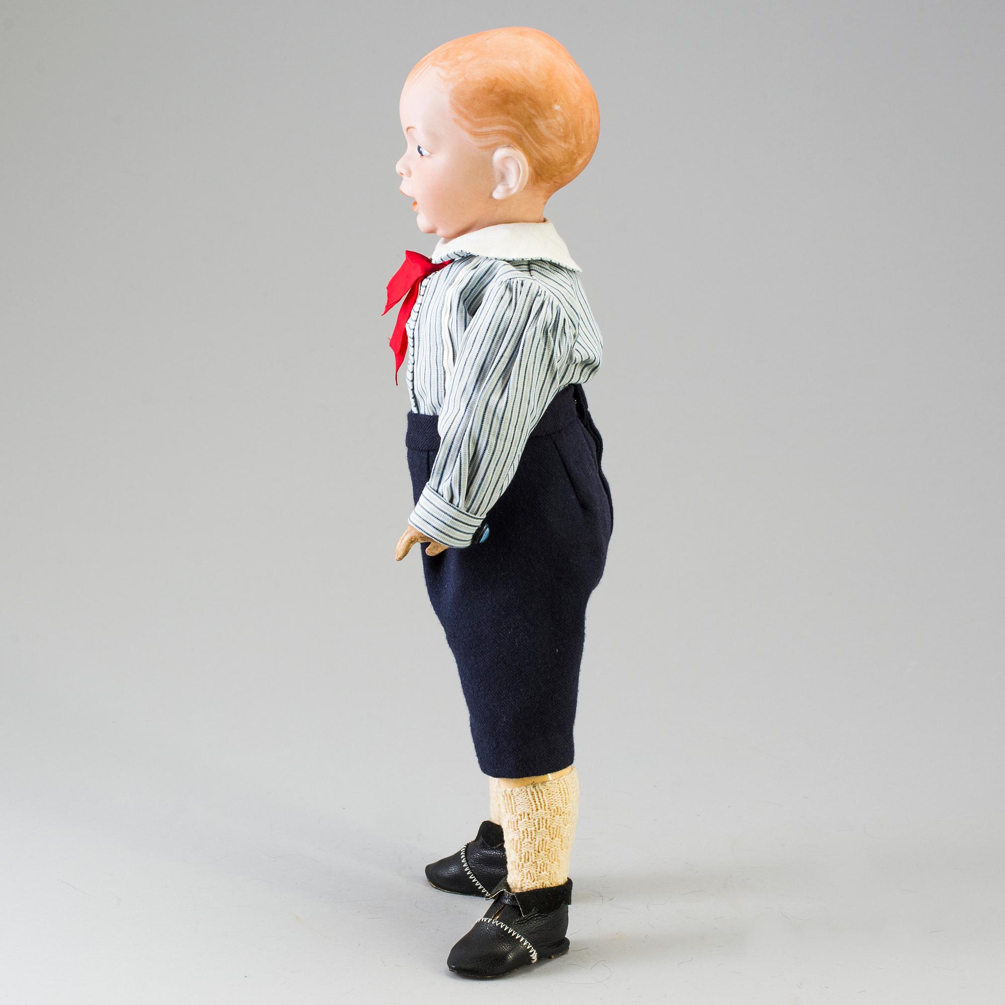 A bisque head character doll marked 226, probably France, 1910s.