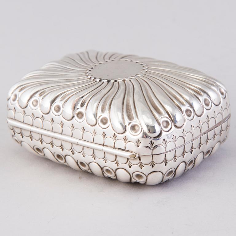 A hinged parcel-gilt soap case, London 1884.