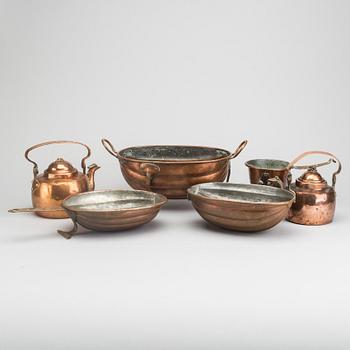 Six 19th century copper pots and pans.