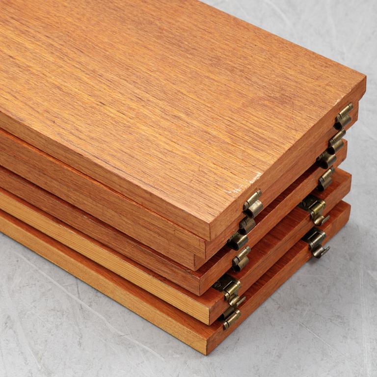 Nils Strinning, a 'String' teak veneer book shelf system.