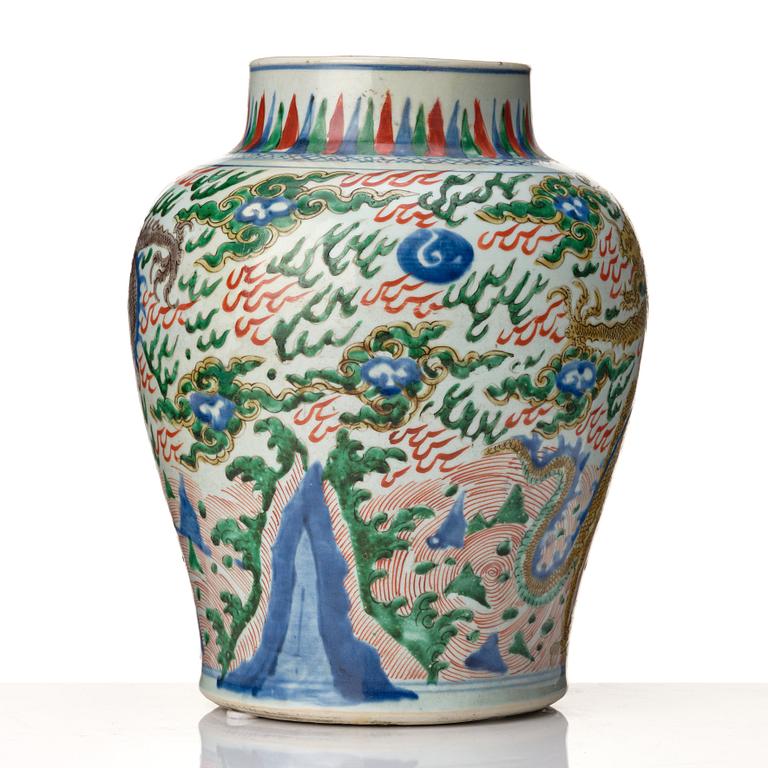 A matched pair of Transitional Wucai jars, 17th Century.