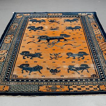 A CARPET, an antique China, late Qing dynasty, ca 311 x 186,5 cm.