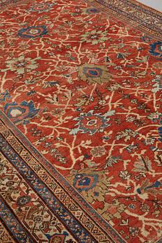 A carpet, an antique Mahal, Ziegler pattern, ca 371,5-374,5 x 265-266 cm (as well as a little flat weave at one end).