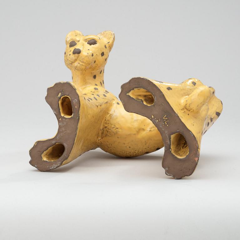 A Vicke Lindstrand yellow glazed ceramic figure of a leopard, Upsala-Ekeby.