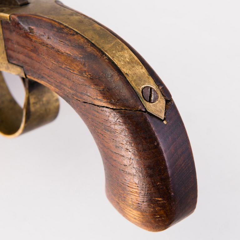 A second half of the 19th Century brass percussion revolver by Johan Engholm.