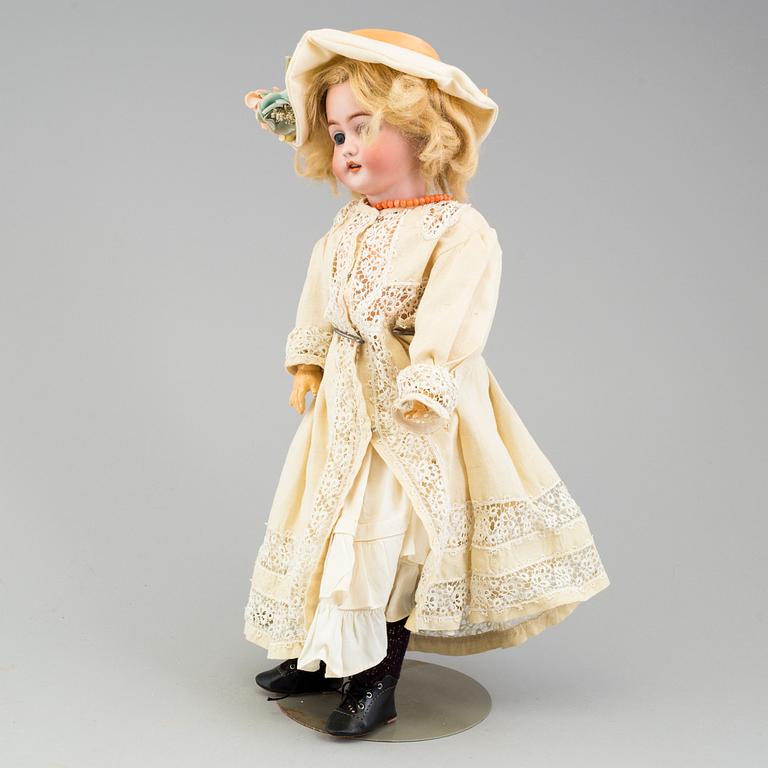 a Franz Schmidt & Co porcellain doll from the early 20th century.