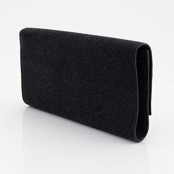 Yves Saint Laurent, a sparkly black leather clutch.