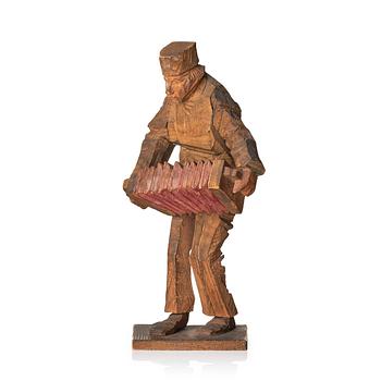 637. Axel Petersson Döderhultarn, Standing Accordionist.