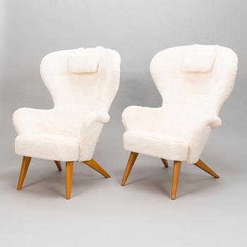 CARL GUSTAF HIORT AF ORNÄS, Two mid-20th century 'Siesta' armchairs for för Puunveisto Oy - Träsnideri Ab.